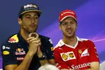 Foto zur News: Daniel Ricciardo (Red Bull) und Sebastian Vettel (Ferrari)