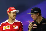 Foto zur News: Sebastian Vettel (Ferrari) und Max Verstappen (Red Bull)