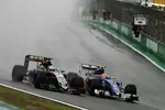 Foto zur News: Nico Hülkenberg (Force India) und Felipe Nasr (Sauber)