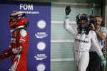 Foto zur News: Kimi Räikkönen (Ferrari) und Nico Rosberg (Mercedes)