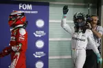 Foto zur News: Kimi Räikkönen (Ferrari) und Nico Rosberg (Mercedes)