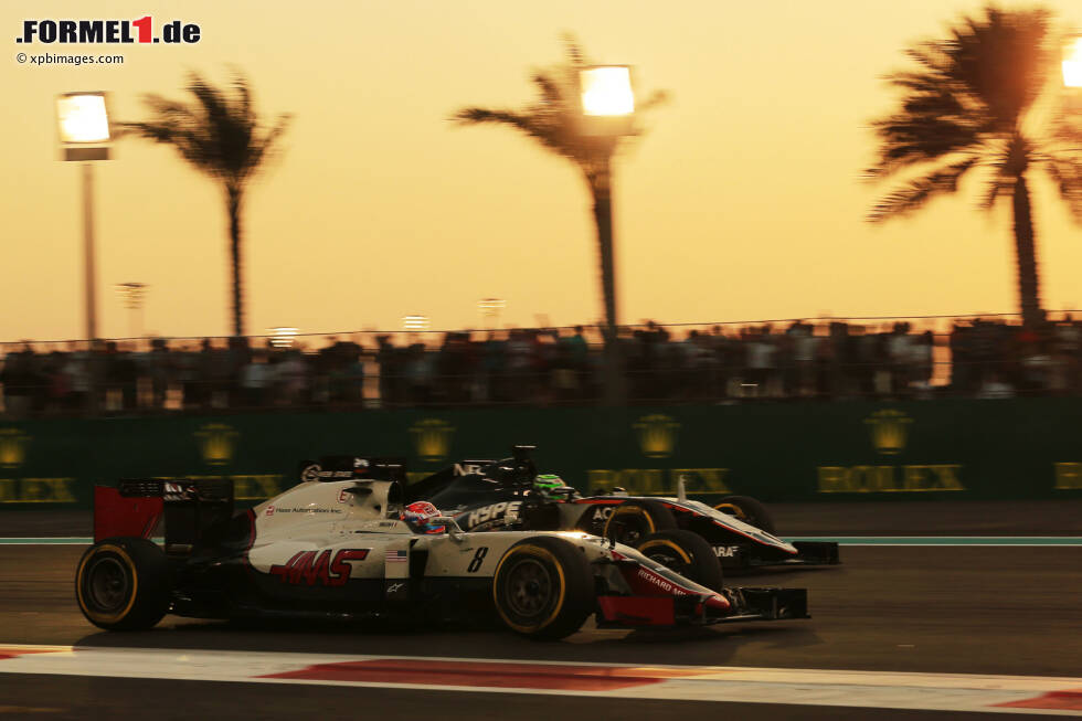 Foto zur News: Romain Grosjean (Haas) und Nico Hülkenberg (Force India)