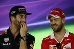 Foto zur News: Daniel Ricciardo (Red Bull) und Sebastian Vettel (Ferrari)