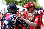 Foto zur News: Kimi Räikkönen (Ferrari) und Moko