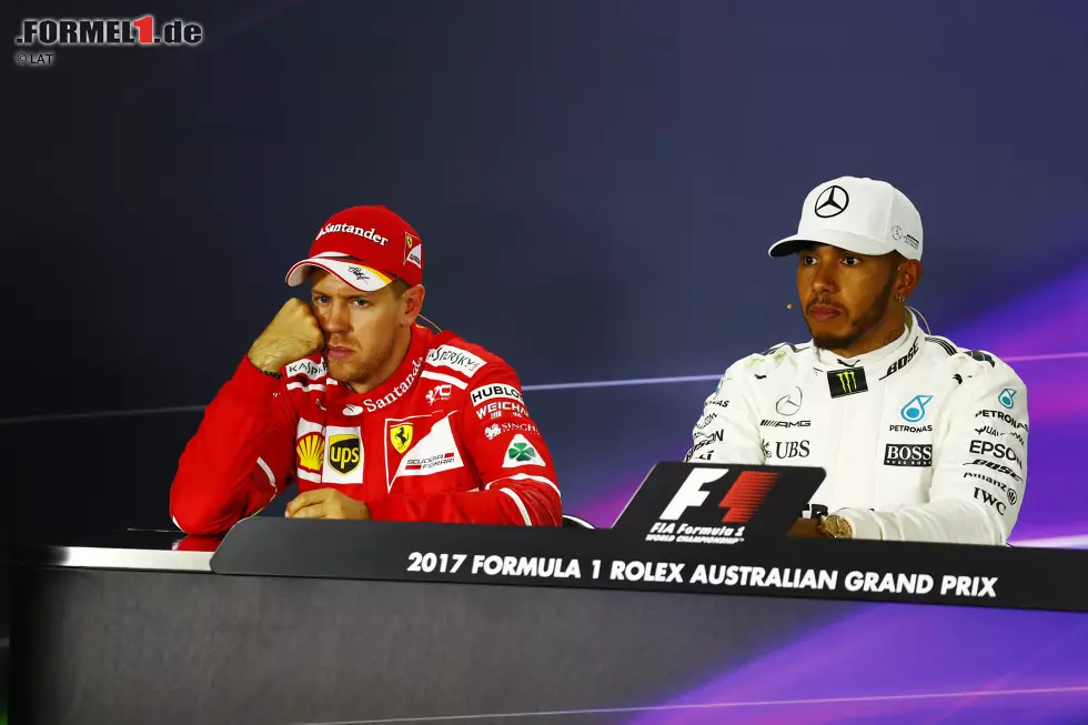 Foto zur News: Sebastian Vettel (Ferrari) und Lewis Hamilton (Mercedes)