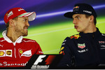 Foto zur News: Sebastian Vettel (Ferrari) und Max Verstappen (Red Bull)