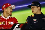 Foto zur News: Sebastian Vettel (Ferrari) und Max Verstappen (Red Bull)