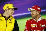 Foto zur News: Nico Hülkenberg (Renault) und Sebastian Vettel (Ferrari)