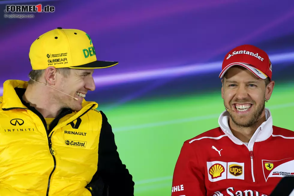 Foto zur News: Sebastian Vettel (Ferrari) und Nico Hülkenberg (Renault)