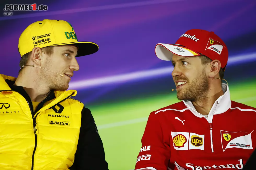 Foto zur News: Nico Hülkenberg (Renault) und Sebastian Vettel (Ferrari)