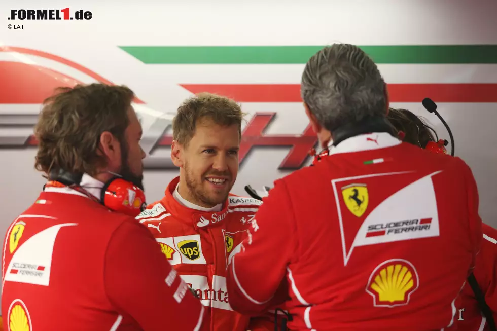 Foto zur News: Sebastian Vettel (Ferrari) und Maurizio Arrivabene