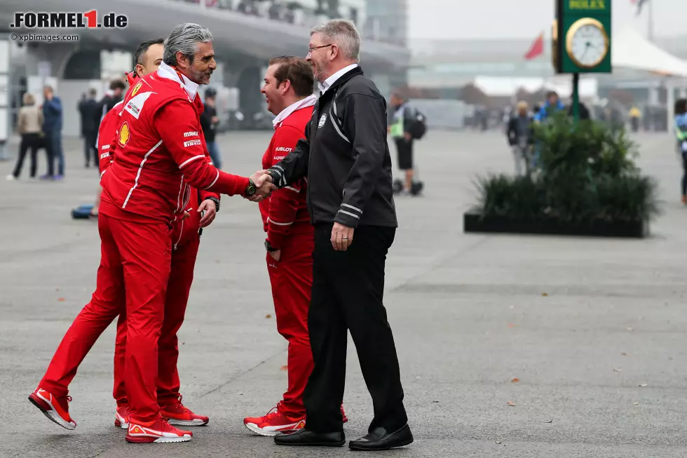 Foto zur News: Ross Brawn und Maurizio Arrivabene