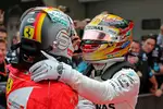 Foto zur News: Sebastian Vettel (Ferrari) und Lewis Hamilton (Mercedes)