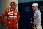 Foto zur News: Sebastian Vettel (Ferrari) und Valtteri Bottas (Mercedes)