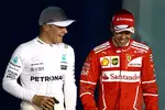 Foto zur News: Valtteri Bottas (Mercedes) und Sebastian Vettel (Ferrari)