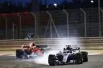 Foto zur News: Valtteri Bottas (Mercedes) und Sebastian Vettel (Ferrari)