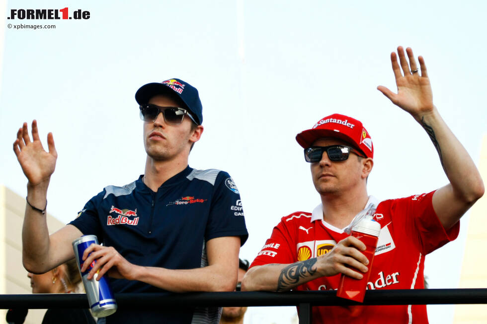 Foto zur News: Daniil Kwjat (Toro Rosso) und Kimi Räikkönen (Ferrari)
