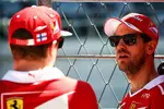 Foto zur News: Sebastian Vettel (Ferrari) und Kimi Räikkönen (Ferrari)