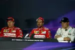 Foto zur News: Sebastian Vettel (Ferrari), Valtteri Bottas (Mercedes) und Kimi Räikkönen (Ferrari)