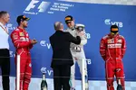 Foto zur News: Sebastian Vettel (Ferrari), Valtteri Bottas (Mercedes) und Kimi Räikkönen (Ferrari)