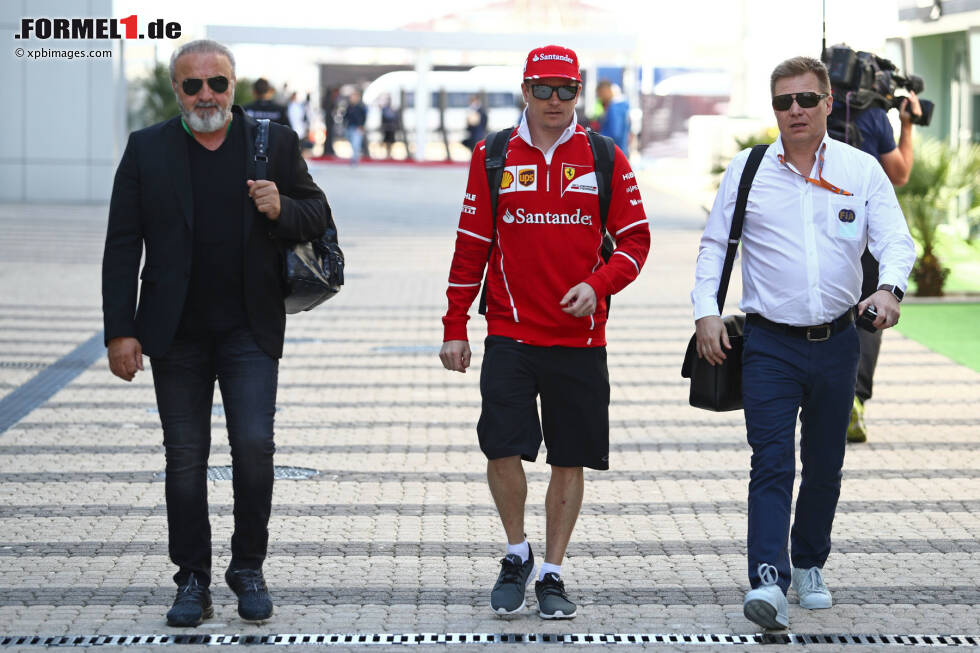 Foto zur News: Kimi Räikkönen (Ferrari) und Mika Salo