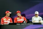 Foto zur News: Sebastian Vettel (Ferrari), Valtteri Bottas (Mercedes) und Kimi Räikkönen (Ferrari)