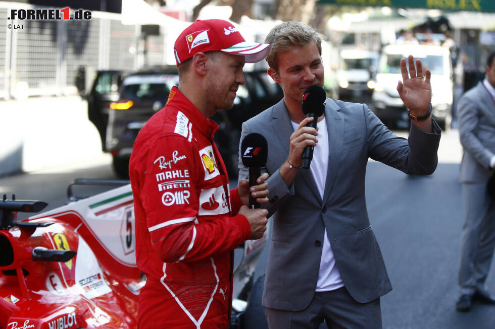 Foto zur News: Sebastian Vettel (Ferrari) und Nico Rosberg