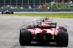 Foto zur News: Sebastian Vettel (Ferrari) und Kimi Räikkönen (Ferrari)