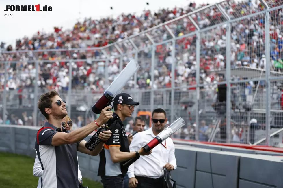 Foto zur News: Romain Grosjean (Haas) und Esteban Ocon (Force India)