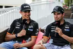 Foto zur News: Esteban Ocon (Force India) und Sergio Perez (Force India)