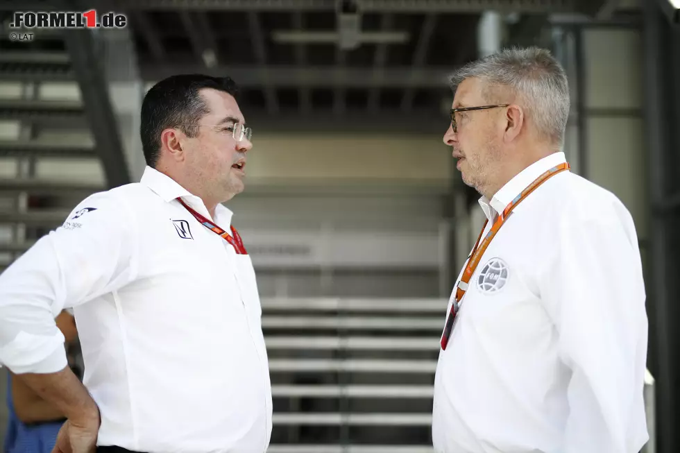 Foto zur News: Ross Brawn und Eric Boullier