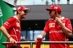 Foto zur News: Sebastian Vettel (Ferrari) und Kimi Räikkönen (Ferrari)