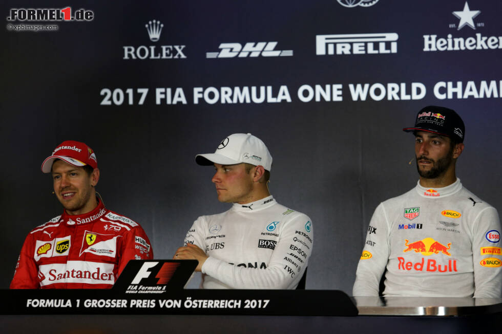 Foto zur News: Sebastian Vettel (Ferrari), Valtteri Bottas (Mercedes) und Daniel Ricciardo (Red Bull)