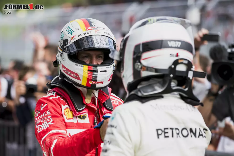 Foto zur News: Sebastian Vettel (Ferrari) und Valtteri Bottas (Mercedes)