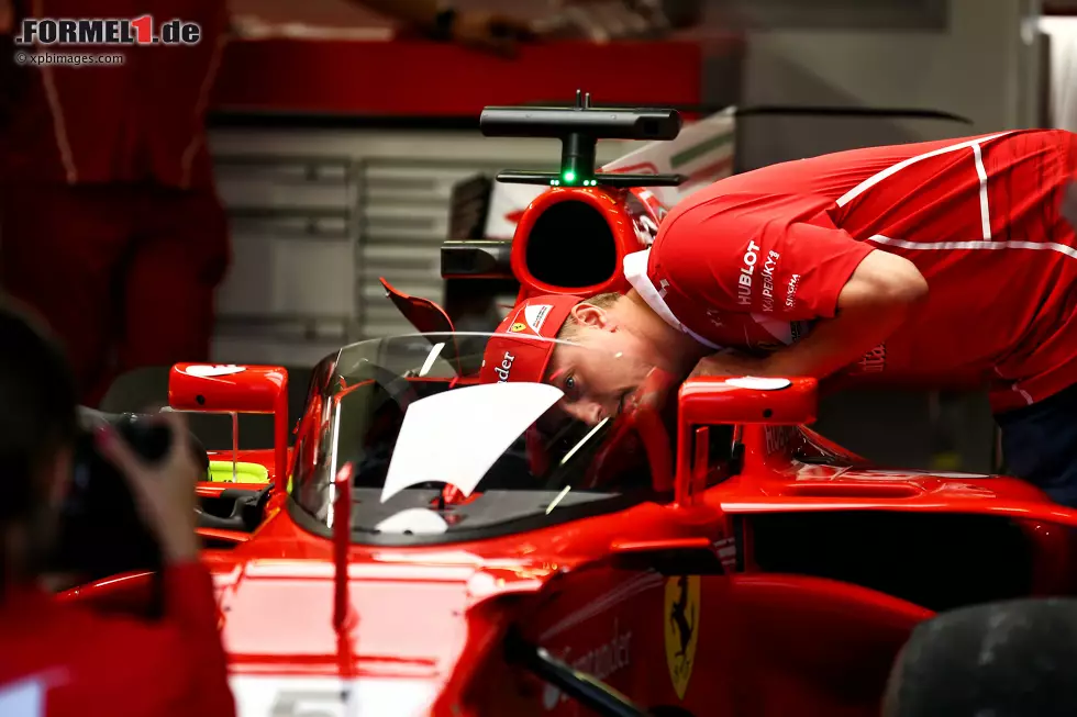 Foto zur News: Sebastian Vettel (Ferrari) und Kimi Räikkönen (Ferrari)