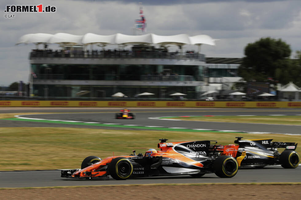 Foto zur News: Fernando Alonso (McLaren) und Nico Hülkenberg (Renault)