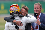 Foto zur News: Lewis Hamilton (Mercedes) und Jenson Button