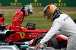 Foto zur News: Sebastian Vettel (Ferrari) und Lewis Hamilton (Mercedes)