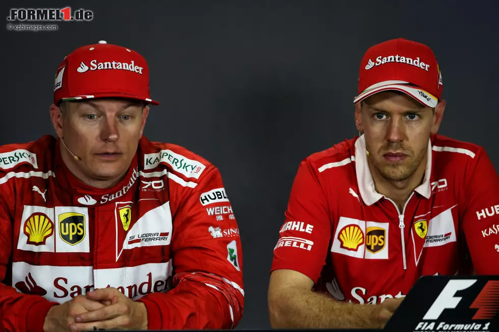 Foto zur News: Sebastian Vettel (Ferrari) und Kimi Räikkönen (Ferrari)