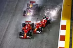 Foto zur News: Sebastian Vettel (Ferrari), Max Verstappen (Red Bull) und Kimi Räikkönen (Ferrari)