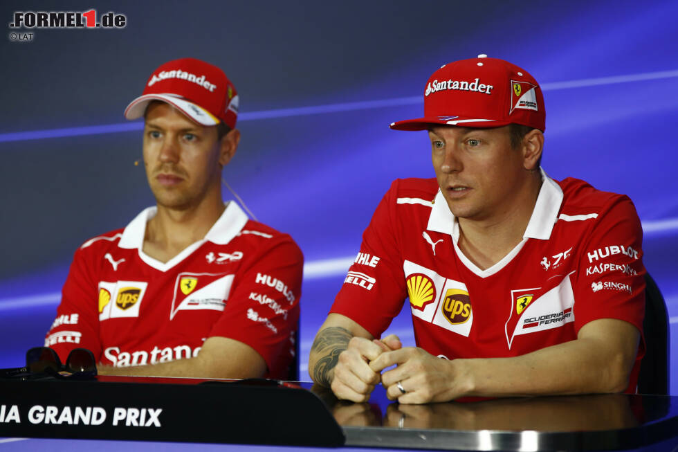 Foto zur News: Kimi Räikkönen (Ferrari) und Sebastian Vettel (Ferrari)