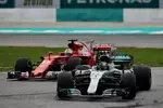 Foto zur News: Valtteri Bottas (Mercedes) und Sebastian Vettel (Ferrari)