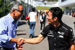 Foto zur News: Hiroshi Yasukawa und Takuma Sato