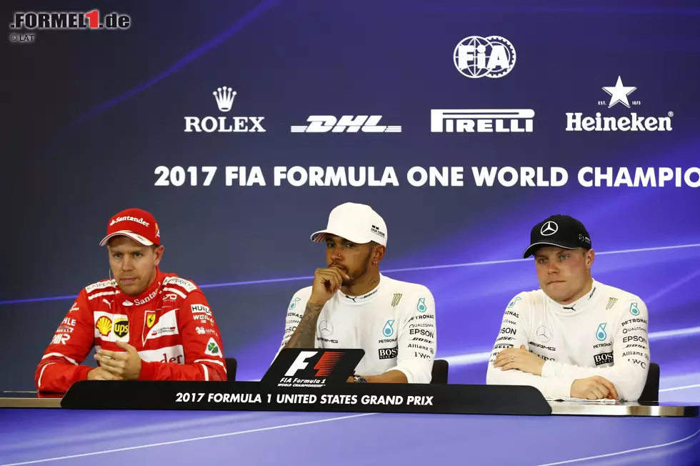 Foto zur News: Lewis Hamilton (Mercedes), Sebastian Vettel (Ferrari) und Valtteri Bottas (Mercedes)