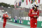 Foto zur News: Sebastian Vettel (Ferrari) und Kimi Räikkönen (Ferrari)