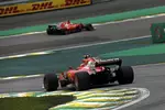 Foto zur News: Kimi Räikkönen (Ferrari) und Sebastian Vettel (Ferrari)