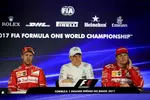 Foto zur News: Sebastian Vettel (Ferrari), Valtteri Bottas (Mercedes) und Kimi Räikkönen (Ferrari)