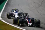 Foto zur News: Romain Grosjean (Haas) und Lance Stroll (Williams)