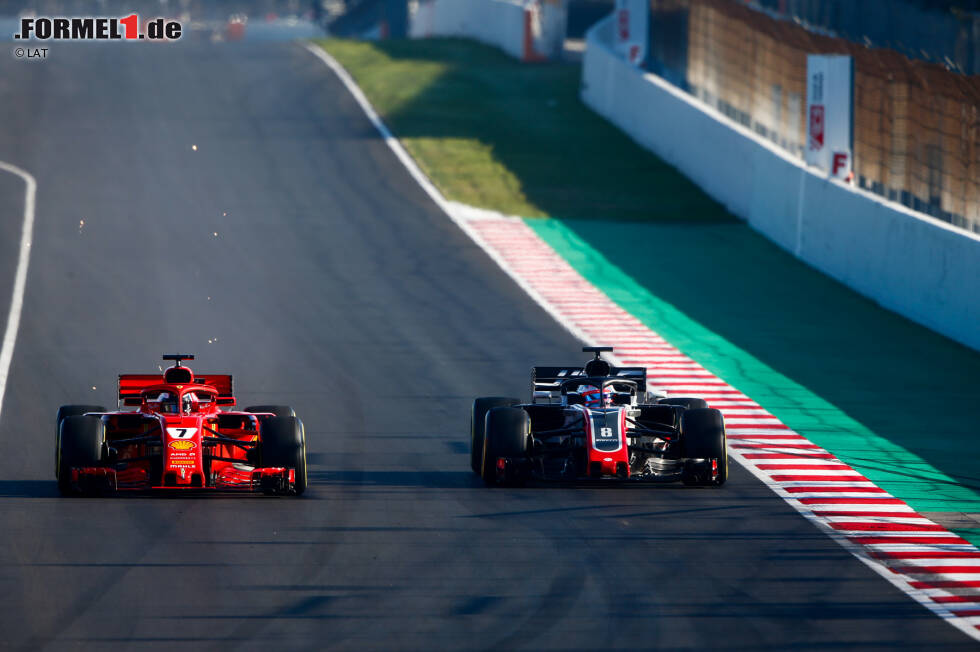 Foto zur News: Kimi Räikkönen (Ferrari) und Romain Grosjean (Haas)