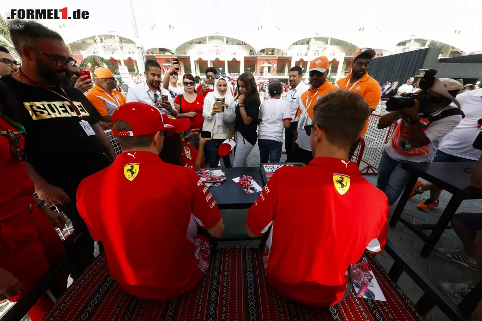 Foto zur News: Sebastian Vettel (Ferrari) und Kimi Räikkönen (Ferrari)